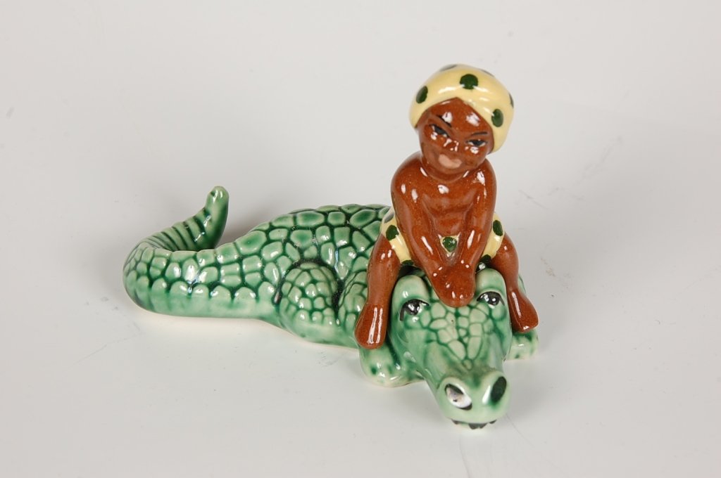 CERAMIC ARTS STUDIO CROCODILE & BOY NESTING FIGURES: Crocodile measures 4.625 inches long, boy measures 2.5 inches high.