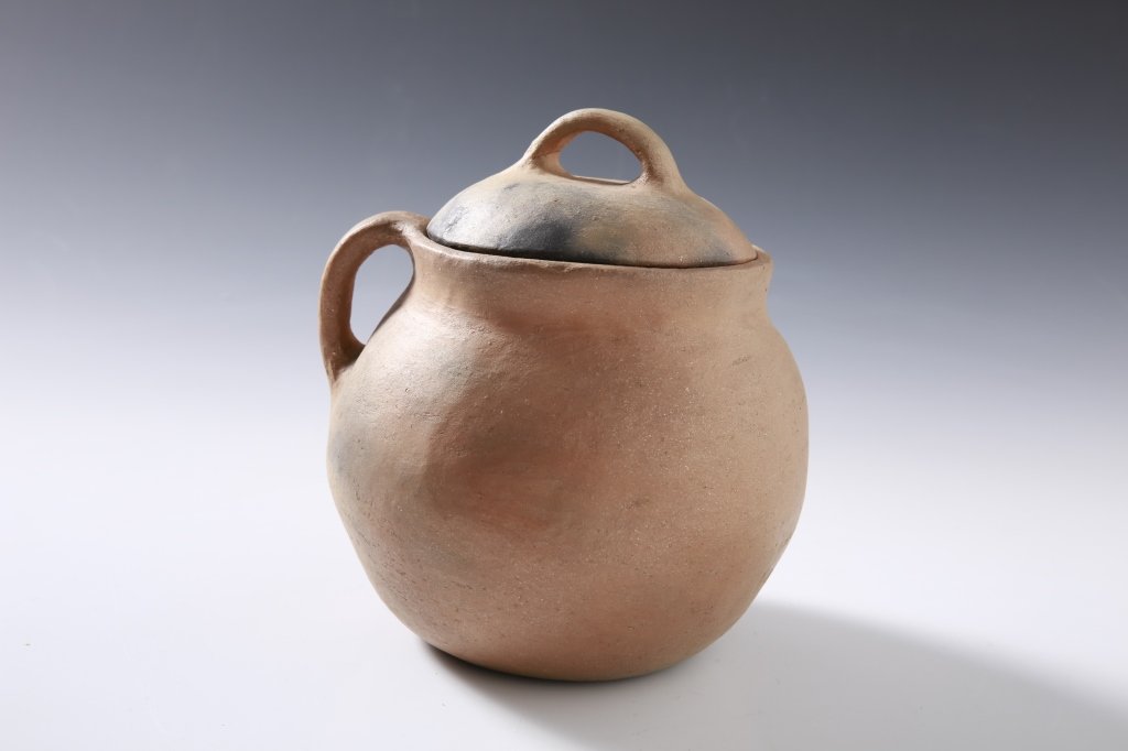 VIRGINIA ROMERO TAOS POTTERY COVERED JAR: Bean jar with lid signed under the base, measures 7.5 x 6.5 inches.