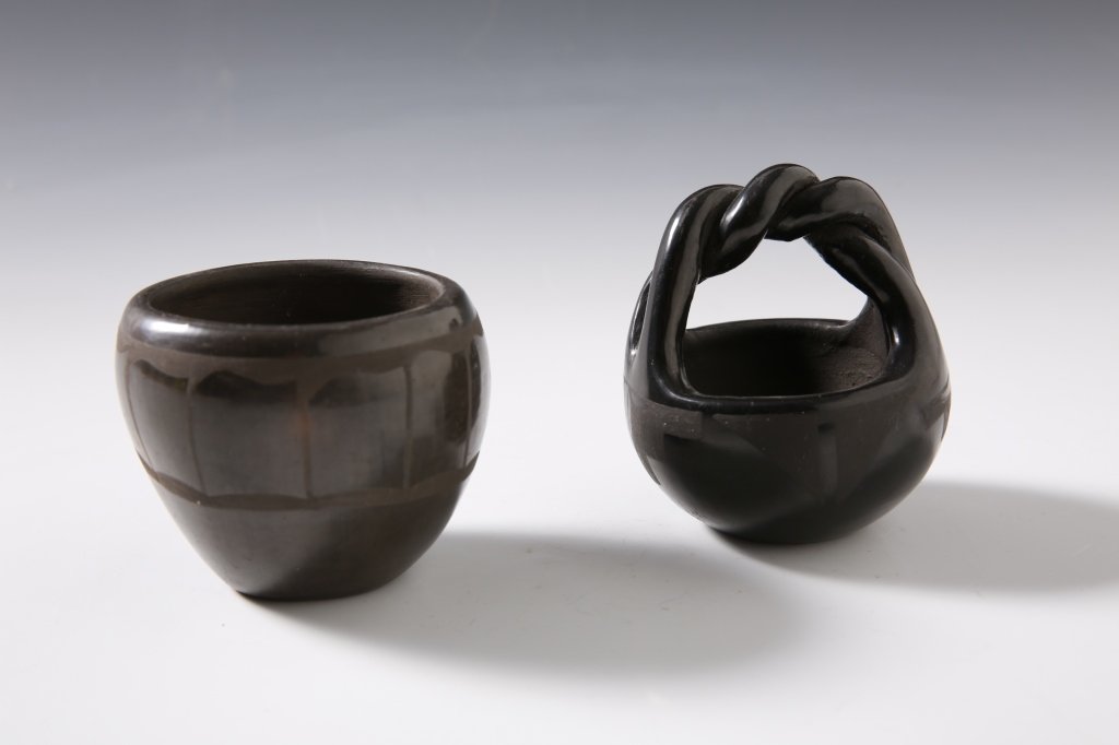 SANTO DOMINGO AND SAN ILDEFONSO POTTERY, 2 PIECES: A San Ildefonso basket signed "Margaret" and a Santo Domingo bowl. Each measures approximately 3 x 3.5 inches.