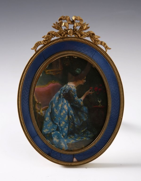 FRENCH ORMOLU PICTURE FRAME WITH GUILLOCHE ENAMEL: Image measures 5 x 3.75 inches, and including the frame measures 7.5 x 5.25 inches overall.
