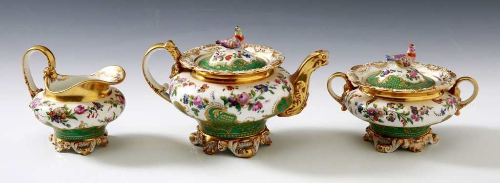 FRENCH PORCELAIN TEA SET SIGNED JACOB PETIT: Three pieces with the tea pot that measures 5.25 x 8 inches including handle, sugar measures 4.25 x 6.25 inches including handles, and the creamer measures 4 x 4.25 inches including the handle. All bu