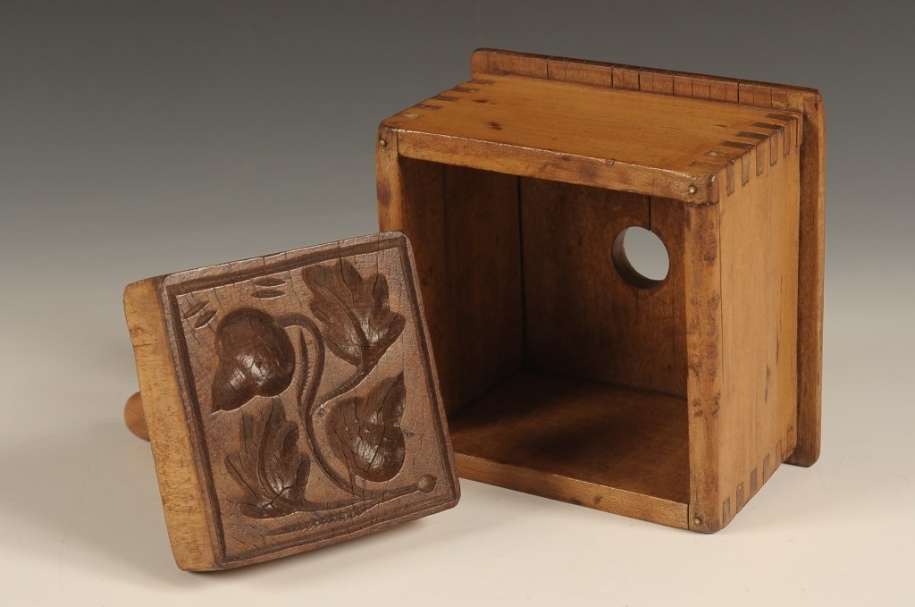 19TH CENTURY BUTTER STAMP MOLD: With brass screws and dove tail construction. Acorn design. Measures 5.5 x 5.75 x 5.75 inches.