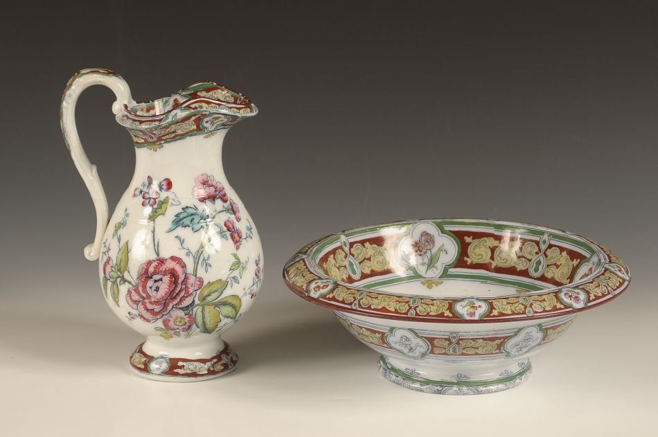 RARE GROSVENOR PATTERN CHILD - SIZED BOWL AND PITCHER: A diminutive size decorated Ironstone bowl and pitcher set in the Grosvenor pattern by Charles Meigh Old Hall Pottery Circa 1860. Pitcher measures 9 x 5.5 inches handle to spout and the basin measures