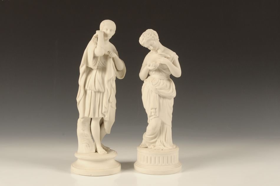 TWO 19TH CENTURY PARIAN FIGURES: Two pieces that measure approximately 13.75 x 4.5 inches each.