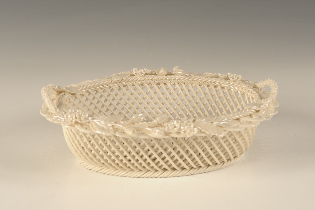 IRISH BELLEEK PORCELAIN BASKET: Gold mark. Measures 2.25 x 7.5 inches.