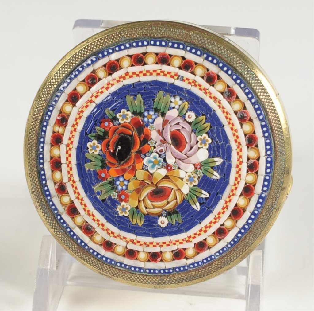 MICROMOSAIC COMPACT WITH A FLORAL DESIGN: Goldtone compact with a micro mosaic top including millefiori, mirrored lid, unmarked. Measures 2.25 inches.