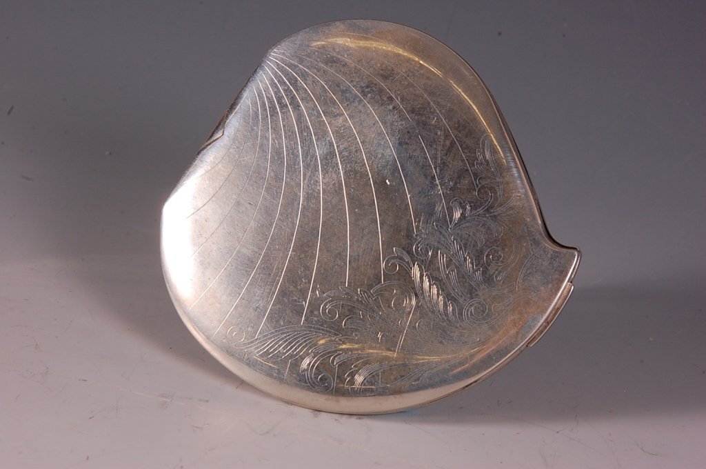 ELGIN AMERICAN STERLING HEART-SHAPED COMPACT: Etched sterling compact with mirrored lid, hinged powder well in the base, marked on the powder well lid, measures 3.5 x 3.25 inches, weighs 4.2 ozt.