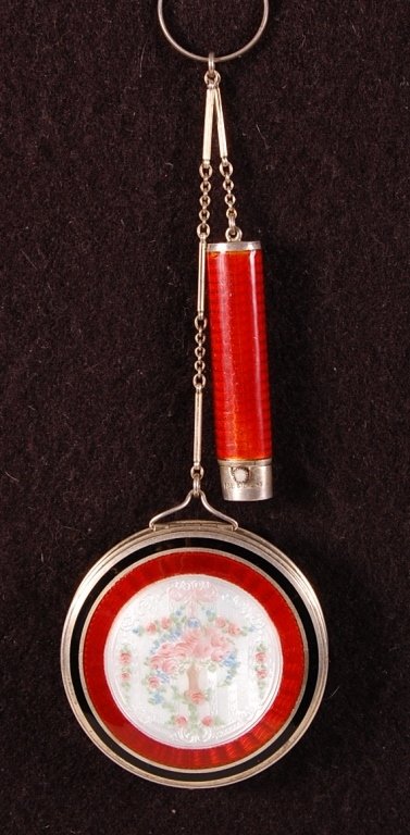 STERLING F & B GUILLOCHE COMPACT WITH LIPSTICK FOB: Foster and Bailey sterling duo compact with red and black guilloche enamel with a hand-painted floral on top, chain handle with finger ring and red guilloche lipstick fob, mirror and rouge well in the