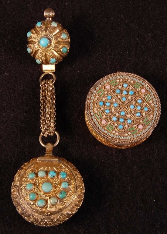 GILDED FILIGREE COMPACT & COMPACT W PERFUME BROOCH: French gilded filigree compact with enameling and blue and pink glass cabochons on the lid, framed beveled mirror in the lid, puff and metal powder pan insert in the base, marked on the bottom, measur