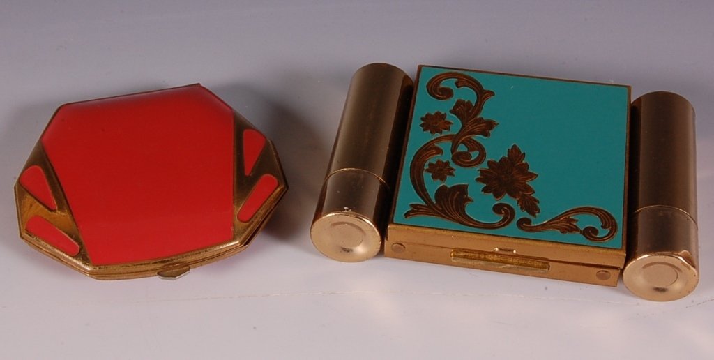 ENAMELED VANITY CASE & AN ENAMELED COMPACT: Green enamel and goldtone vanity case with a lipstick and a perfume with a glass vial on each side, compact in the center with a mirrored lid, Zell Fifth Avenue branded puff and mesh sifter, unmarked,