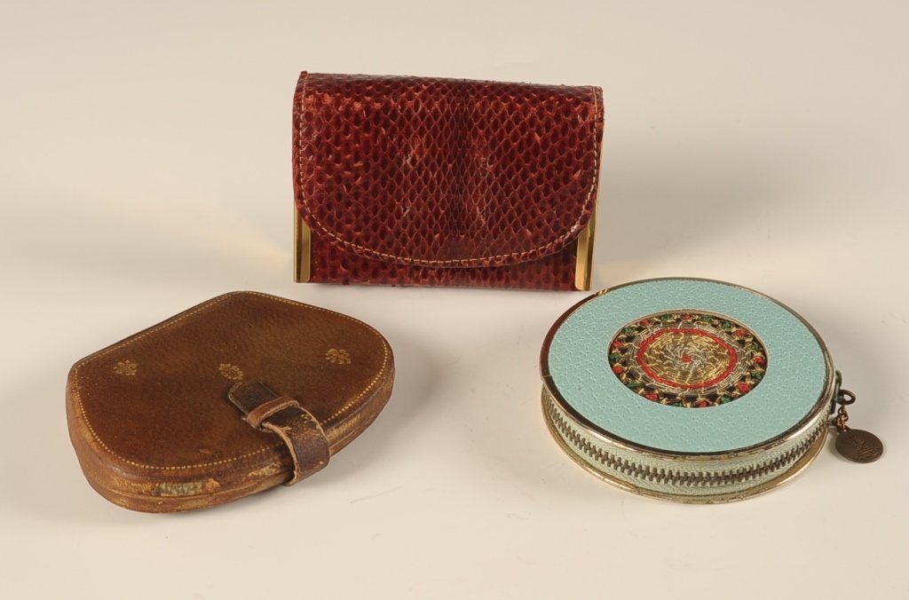 ROSENFELD ISRAEL SOUVENIR COMPACT, PLUS TWO LEATHER: Teal blue zippered leather souvenir compact from Israel with a woven center decoration, plastic frame with a mirrored lid, mesh sifter and a branded puff, marked in the powder well, measures 3 inches,