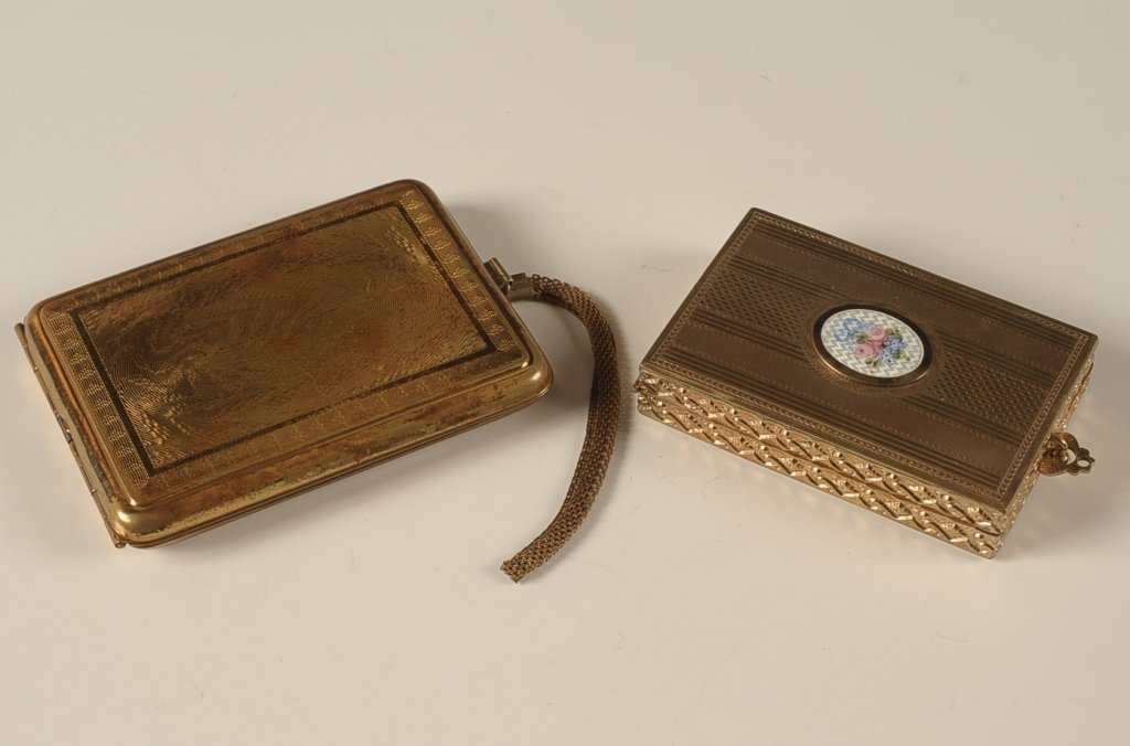 D.F.B. CO. MINIAUDIERE & 1923 PATTIE DUETTE LARGE: D.F. Briggs Co. goldtone miniaudiÃ¨re with a guilloche medallion with hand painted roses on top, framed mirror in the lid, base holds wells for powder and rouge and two lipsticks, no pans or puffs, 