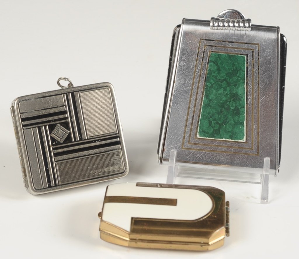 THREE VINTAGE ENAMELED COMPACTS: Measure 2 to 3 inches.