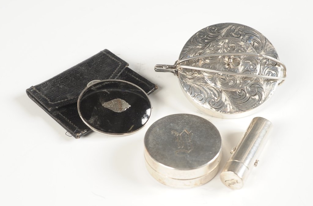 HAND MIRROR COMPACT, SMALL ENAMEL COMPACT, MORE: Chased silver compact with a foldout handle for a hand mirror, pull off lid, small puff, unmarked, measures 5.25 x 2.5 inches when unfolded. Small black enamel compact with leather case, with pan and