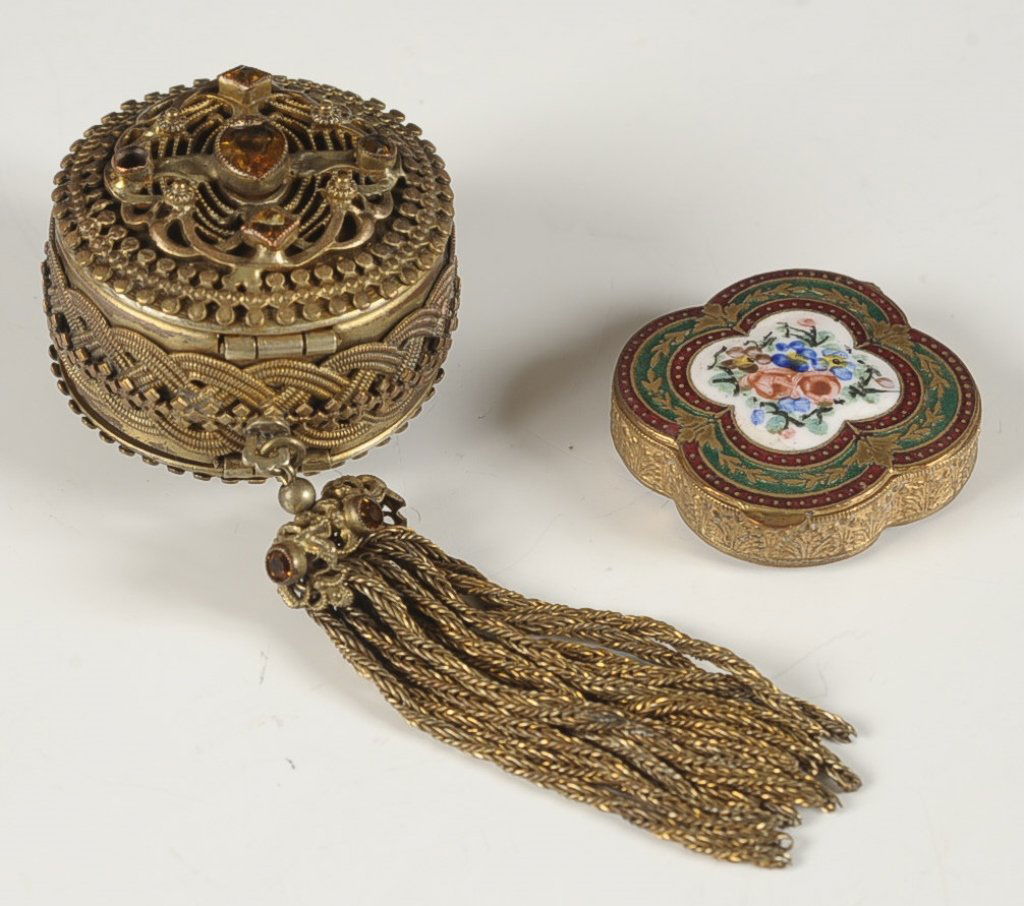 FRENCH ENAMEL COMPACT & A JEWELED FILIGREE COMPACT: Small antique French enamel compact with a porcelain medallion on the top, framed beveled mirror in the lid, marked on the rim, measures 1.5 inches, very good. Plus an antique jeweled filigree double-