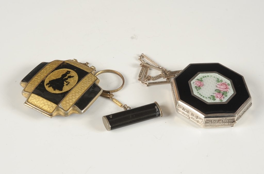 STERLING GUILLOCHE COMPACT & LA MODE DUO COMPACT W: Black enamel and guilloche sterling duo compact, chain handle, framed mirror in the lid, base holds a rouge well with pan and puff over a powder well with metal sifter and puff, marked metal on the in