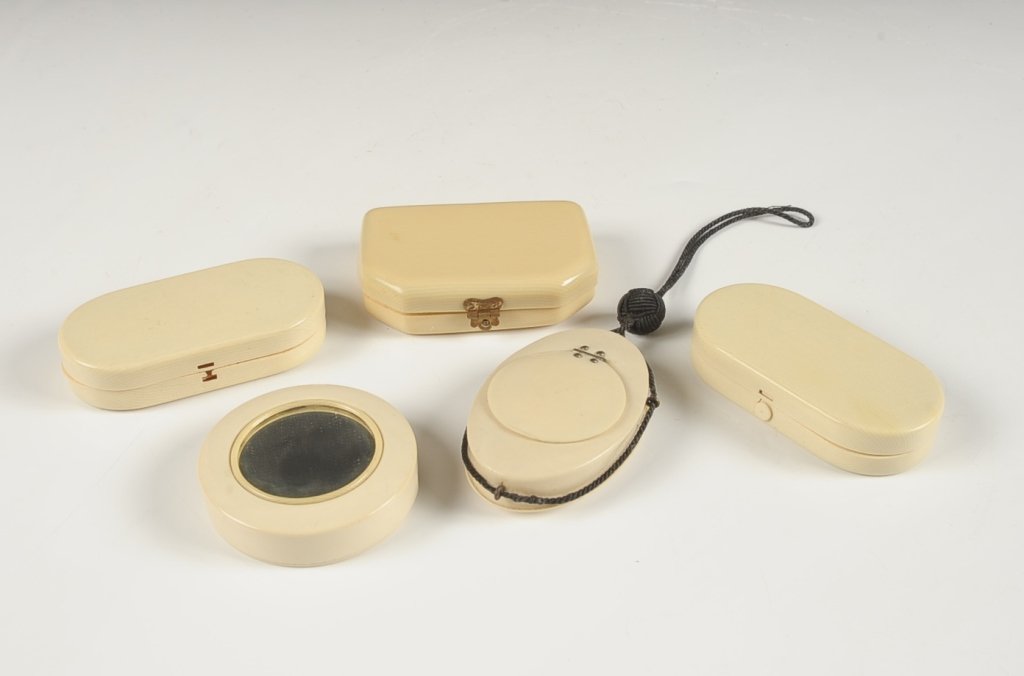 FIVE VINTAGE PLASTIC COMPACTS IN IVORY: Two Fuller Brush Co., measure 2.5 to 3.5 inches.