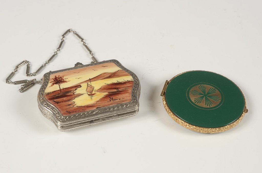 FMCO ENAMELED COMPACT W PAINTED SCENE & ANOTHER: Yellow enamel on silvertone with a hand-painted sailboat scene on top, chain handle, mirror and rouge well in the lid (mirror missing), base holds a powder well with rotary sifter and change holders, 