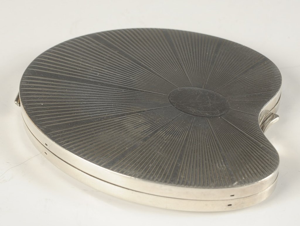 STERLING VOLUPTE PAINTER'S PALETTE COMPACT: Silvertone compact with a framed mirror in the lid, mesh sifter in the base, marked on the base, no puff, measures 3.5 x 3 inches, weighs 4.35 ozt.