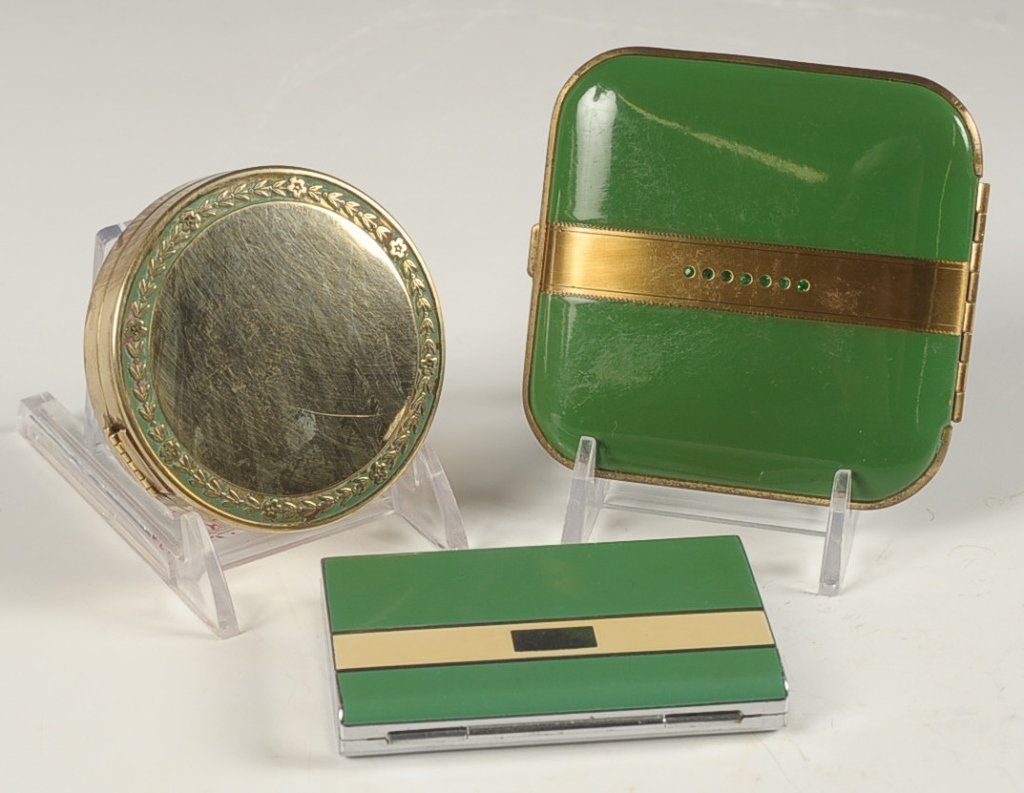 MONDAINE, BOURJOIS & DJER-KISS ENAMEL COMPACTS: Three green enamel on goldtone compacts/vanity cases, measure 2.5 to 3.25 inches.