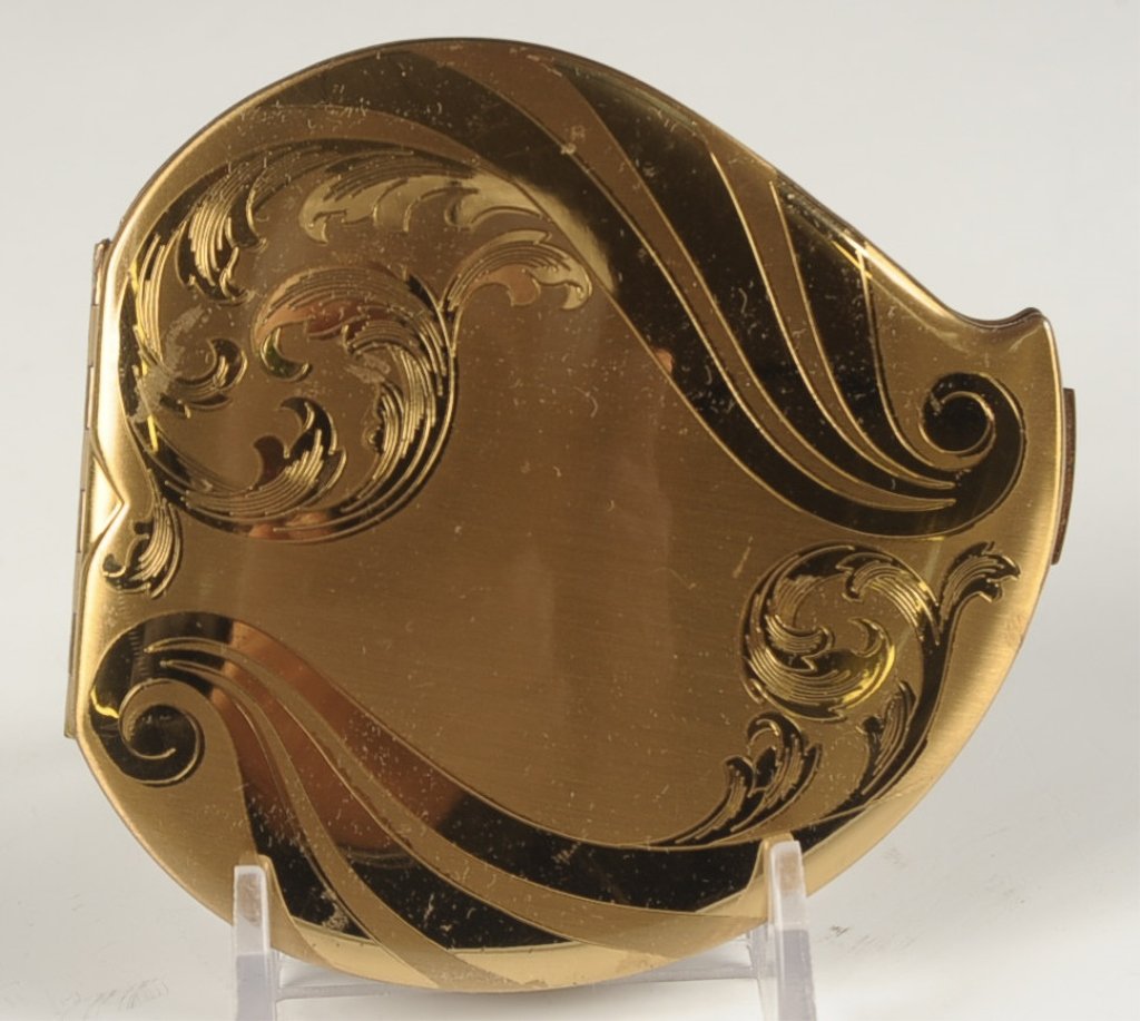 ELGIN AMERICAN HEART-SHAPED COMPACT: Mirrored lid, hinged powder well with mark on top, measures 3.5 x 3.25 inches.