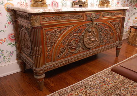 19TH C. FRENCH MARBLE TOP SIDEBOARD WITH BRONZE PLAQUES: A good Louis XV style French sideboard circa 1880, major bronze mounts over the whole with large high relief bronze plaques at each end and front where the two doors open to reveal six drawers. The