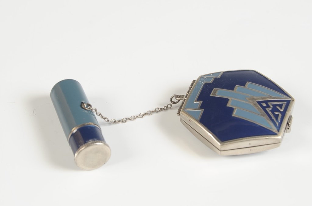ART DECO CARA MIA COMPACT WITH A LIPSTICK FOB: Duo compact in blue enamels with an enameled lipstick fob, polished metal mirror over a rouge well with pan and branded puff, hinged rouge well with branded puff, measures 4.75 x 2 inches.