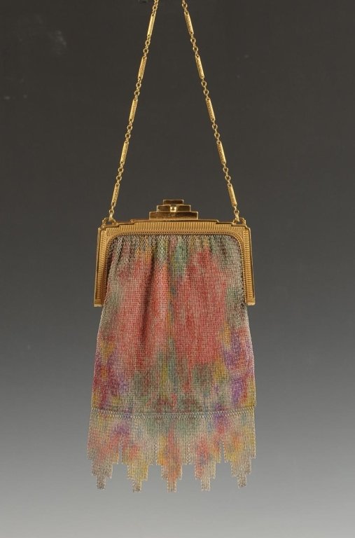 WHITING & DAVIS PAINTED DRESDEN MESH BAG: Fine mesh bag with an abstract painted design, Art Deco goldtone frame, chain handle, scalloped skirt, marked inside the bag frame, satin lining with pocket and beveled hand mirror, measures 7.5 x 4 i