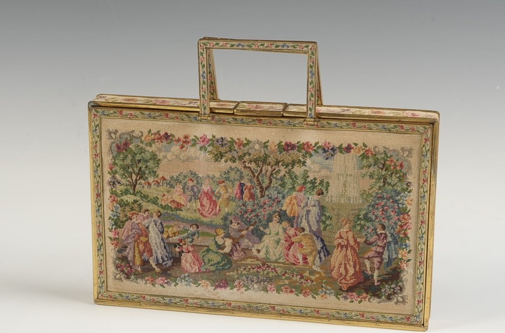 AUSTRIAN HAND MADE PETIT POINT VANITY SET W PURSE: Wiener Wertarbeit Austrian hand made petit point purse with gold frame, stitching on all sides and the handles, satin lining with pockets for a petit point compact, cigarette case and comb, plus a gol