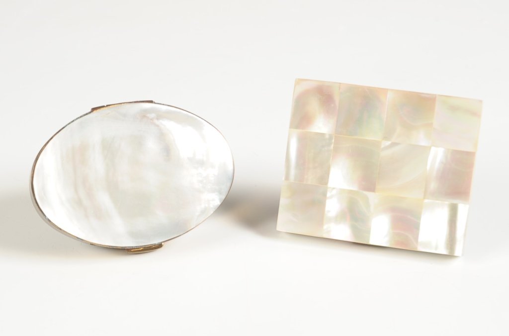 KAYCRAFT & ELGIN AMERICAN MOTHER-OF-PEARL COMPACTS: Oval Kaycraft compact measures 2.25 x 3 inches, and Elgin American measures 2.25 x 3 inches.