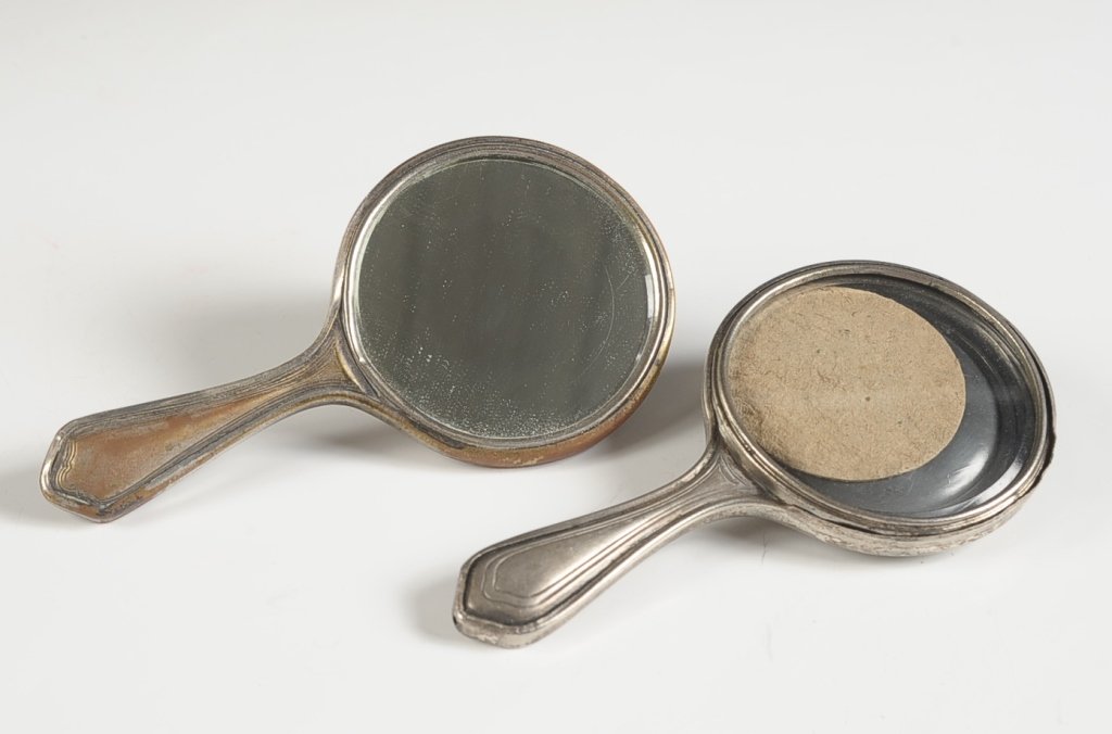 TWO HAND MIRROR COMPACTS: Unmarked, measure 5 x 2.5 inches each.