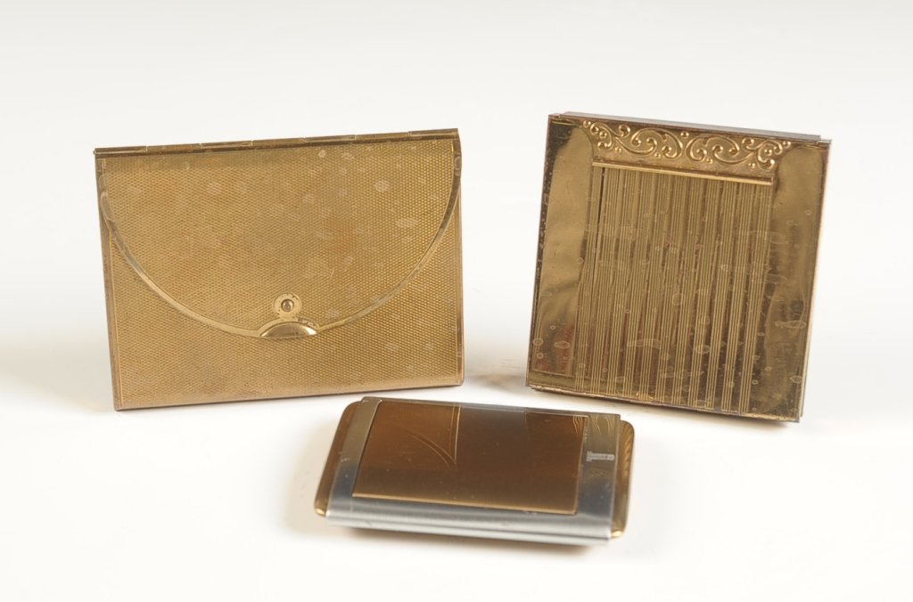 VINTAGE COTY, LENTHERIC AND AVON COMPACTS: Three vintage goldtone compacts ranging in size from 2.25 x 2.75 inches, up to 2.75 x 3.5 inches.