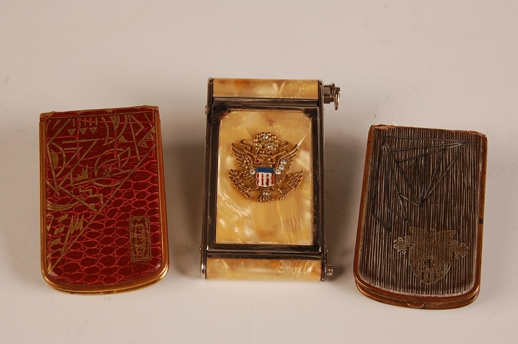 GIREY VANITY CASE W EAGLE & MONDAINE LEATHER COVERED: Girey vanity case with faux mother of pearl, The Great Seal of the United States eagle on the top in enamel and crystals, lipstick inserts on one side, pop up lid with beveled mirror, rouge pan with p