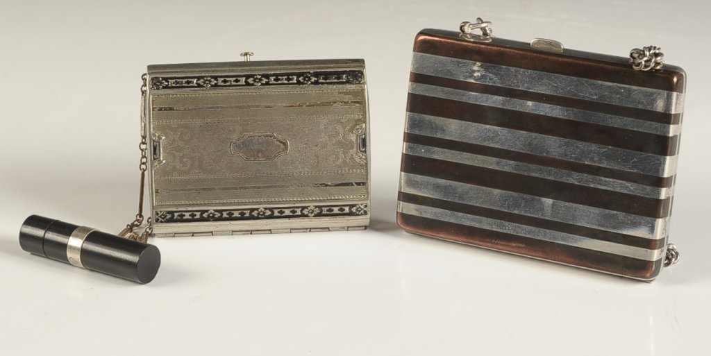TERRY MINIAUDIERE, PLUS ANOTHER: Terry miniaudiere with a lipstick fob, measures 3 x 2.25 inches, good with some minor spots of oxidation. Two tone briefcase style miniaudiere, measures 3 x 3.75 inches, some scattered shallow dents.