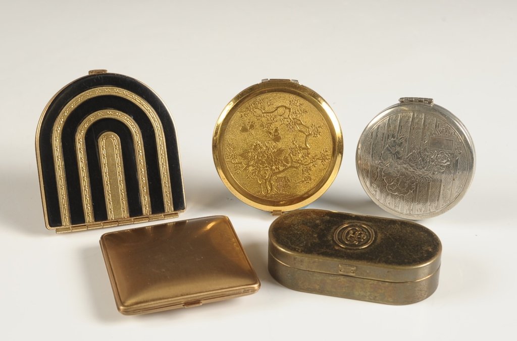 FIVE VINTAGE COMPACTS: 1925 L'Ame compact, Vanstyle enameled duo compact, Elgin American duo compact, Langlois 'Shari' compact, and Colgate & Company duo compact. Measure from 2 to 2.75 inches.