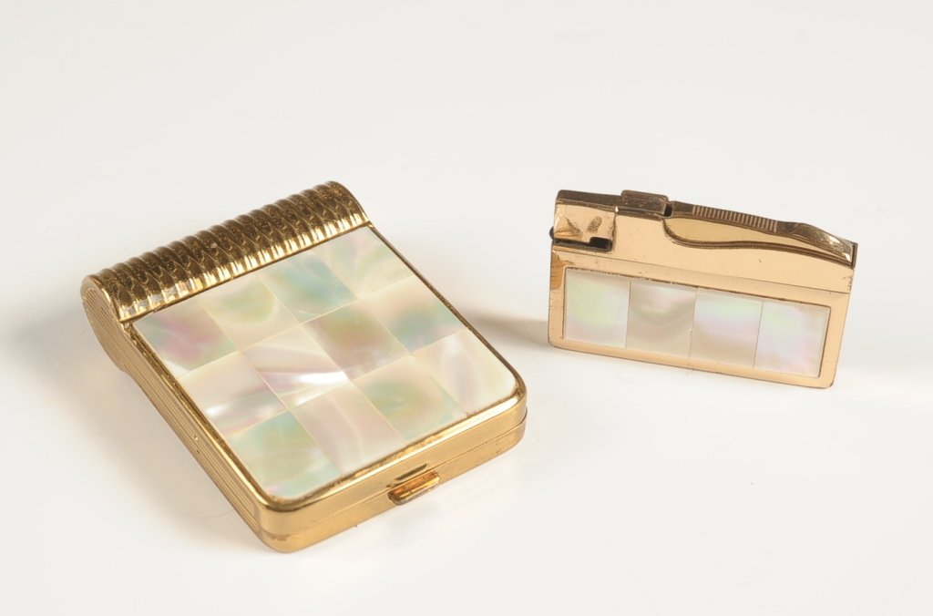 EVANS MOTHER OF PEARL VANITY CASE & ELGIN AMERICAN: Evans mother of pearl vanity case with framed mirror in the lid, base holds a hinged powder well and a full size lipstick, marked on the powder well lid, measures 3 x 2 inches. Plus an Elgin American 
