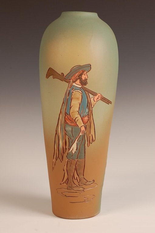 WELLER DICKENS WARE ARTIST SIGNED VASE: Initialed 'AD' for Anthony Dunlavy, impressed half round Weller Dickens Ware mark on the bottom, measures 16.5 x 6 inches. Please note that this item will be shipped by our in-house shipping departmen