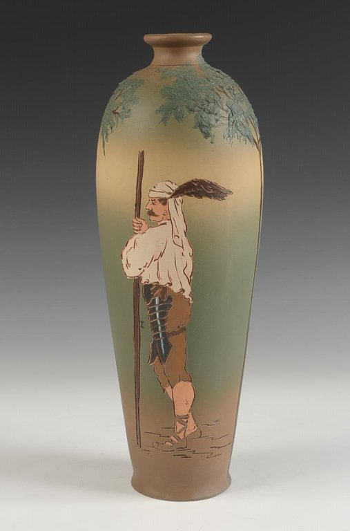 14 INCH WELLER DICKENS WARE VASE: Matte glaze, glaze signed with an 'L', marked with the half circle seal on the bottom, measures 14 x 4.5 inches. Please note that this item will be shipped by our in-house shipping department and is s