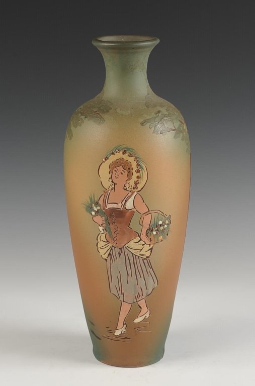 13 INCH WELLER DICKENS WARE VASE: Matte glaze, marked with the half circle seal, measures 13.5 x 4.5 inches. Please note that this item will be shipped by our in-house shipping department and is subject to a 14 day return policy guara