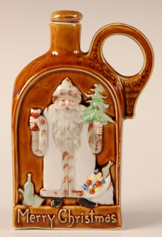 SCHAFER & VATER 'MERRY CHRISTMAS' SANTA CLAUS FLASK: With a single handle, faint impressed mark, measures 6 x 4 inches. Please note that this item will be shipped by our in-house shipping department and is subject to a 14 day return policy guarantee. If