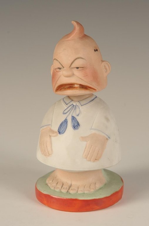 SCHAFER & VATER CRYING KID NODDER: Color glaze, impressed mark, measures 5 x 2.5 inches. Please note that this item will be shipped by our in-house shipping department and is subject to a 14 day return policy guarantee. If any piece in