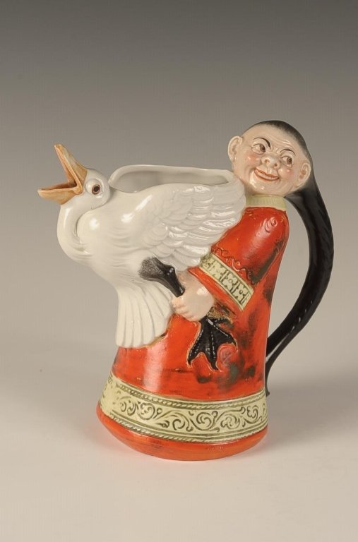 SCHAFER & VATER CHINAMAN & GOOSE COLOR PITCHER: Impressed mark, measures 6.5 x 6 x 3.25 inches. Please note that this item will be shipped by our in-house shipping department and is subject to a 14 day return policy guarantee. If any piece in this