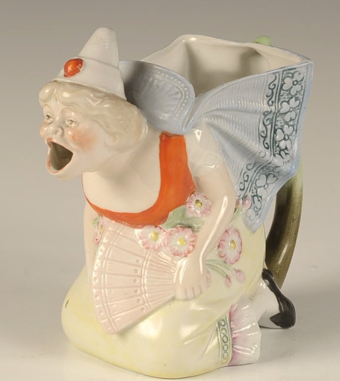 SCHAFER & VATER FAN LADY CREAMER: Color glaze, impressed mark, measures 5.25 x 5.25 x 3 inches. Please note that this item will be shipped by our in-house shipping department and is subject to a 14 day return policy guarantee. If any