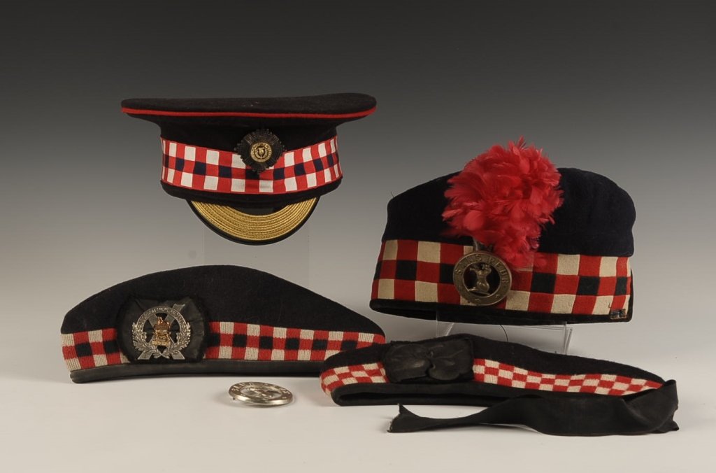 FOUR SCOTTISH GLENGARRY AND VISOR CAPS: Includes a Gordon Highlanders glengarry size 7-1/2, A&S Highlanders Balmoral size 6-7/8, plus one unadorned glengarry cap size 7-1/2. Also includes a Scot's Guards visor cap size 58, and named to Sgt
