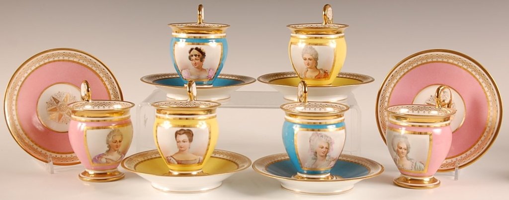 SIX SEVRES HAND PAINTED PORTRAIT CUP AND SAUCER SETS: Each with a different portrait, signed signed â€œM. Imp le de Sevresâ€ in iron red on both the saucer and the footed cup. Each with a 5.25 inch diameter saucer, and each cup measures 4 high x 3