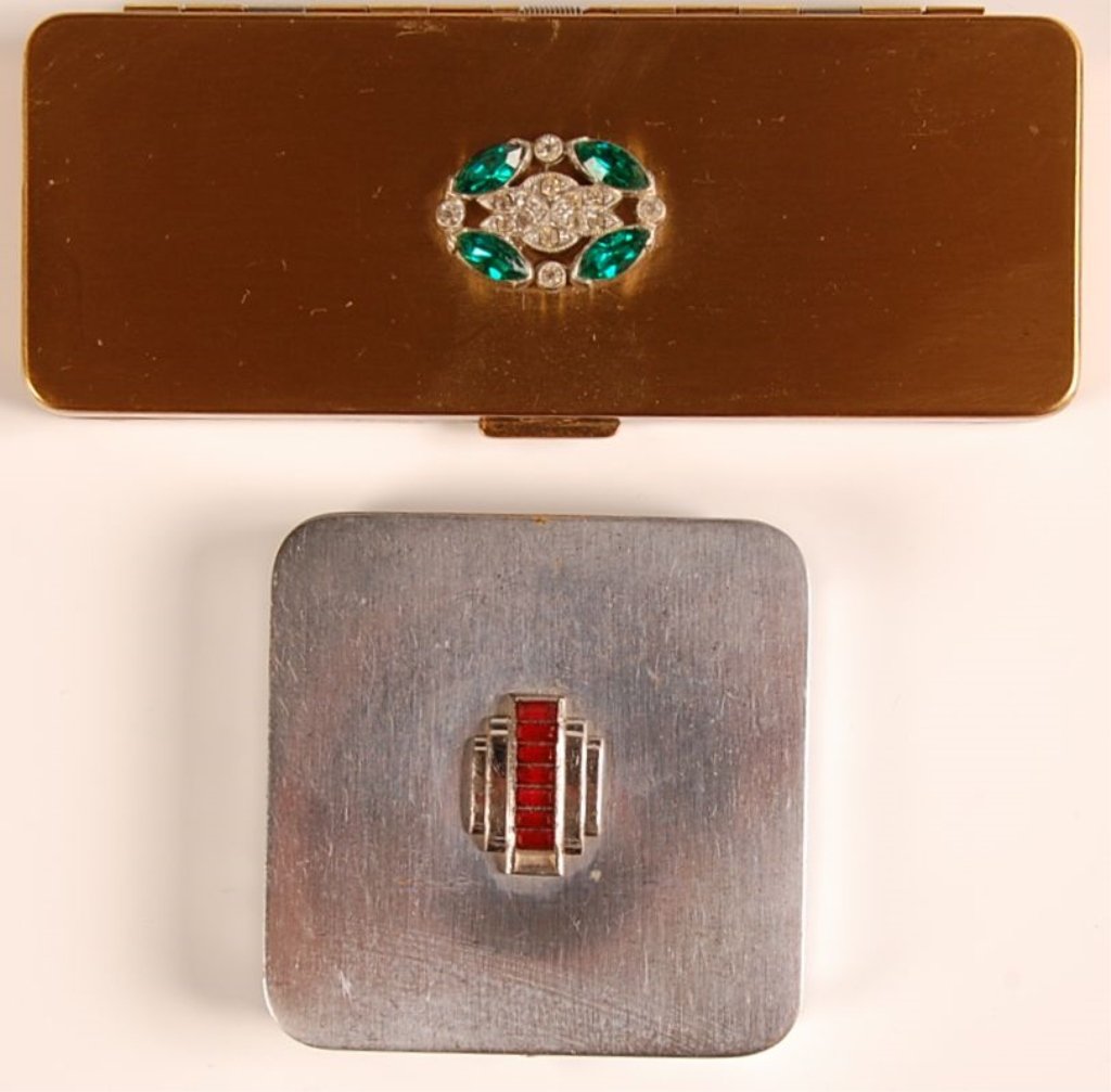 EVANS COMPACT & VOLUPTÉ MINIAUDIÈRE W JEWELED TOPS: Evans silvertone duo compact with an Art Deco red jeweled decoration on the top, hinged metal mirror in the lid over a rouge well with pan, hinged powder well in the base, marked on the powder well, m