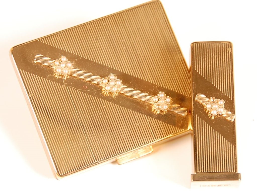 CINER VANITY SET WITH SLIPCASE: Jeweled goldtone compact and matching lipstick in a satin slipcase, overall case measures 2.75 x 3.5 inches.