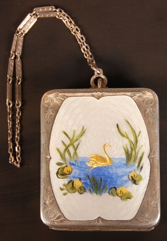 STERLING & GUILLOCHE VANITY CASE W GOLD LEAF SWAN: Chain handle, white guilloche with hand painted details and a swan in gold leaf, hand chased designs on top and embossed sides, gilded metal interior, framed mirror and rouge well in the lid, base hol