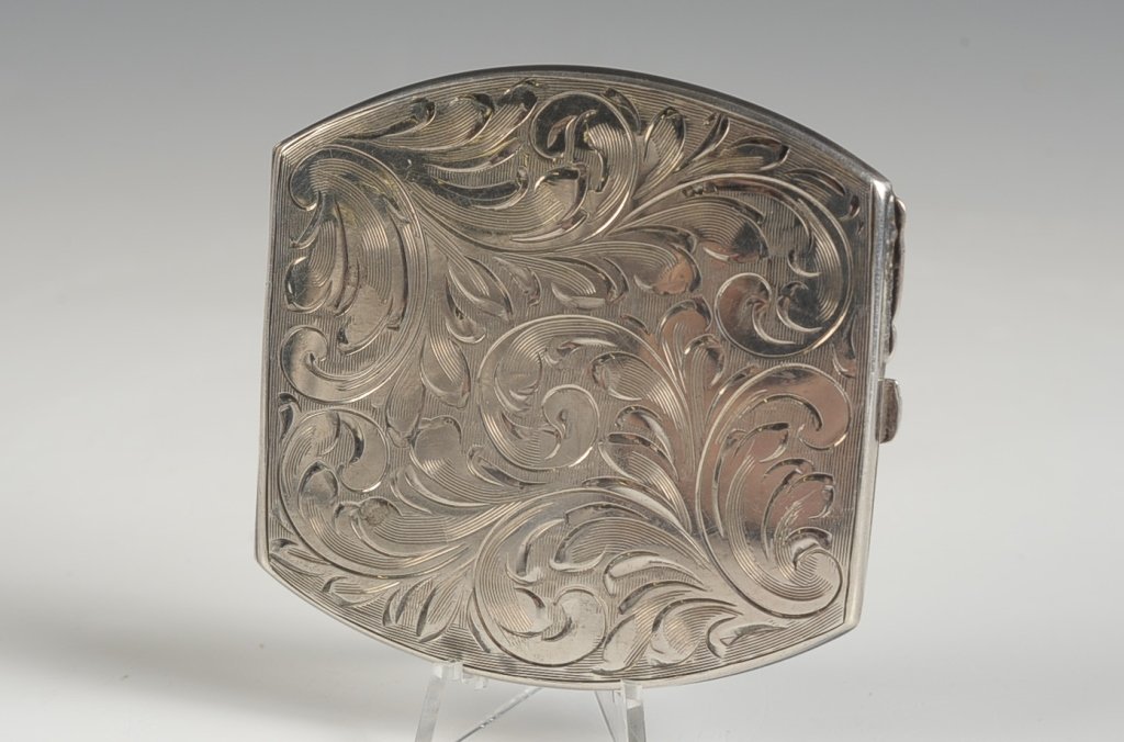 HAND-CHASED STERLING COMPACT: Framed mirror in the lid, marked on the bottom, measures 2.5 x 2.5 inches, weighs 2.2 ozt.