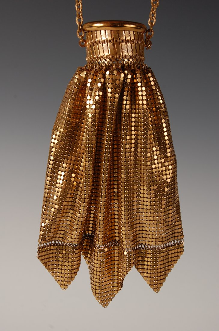 WHITING & DAVIS SCISSOR NECK ARMOR MESH PURSE: Goldtone armor mesh bag with chain handle and a scissor neck closure, satin lining, marked with a satin tag, measures 12.5 x 5 inches, with a 4 inch drop from handle.
